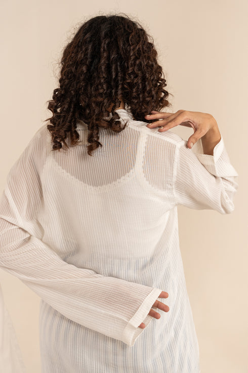 Off White Orange Fabric Oval Shaped Hem Short Kurta